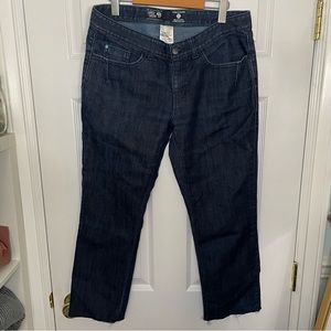 Mountain Hardware dark denim jeans with raw edge hem. Size 12